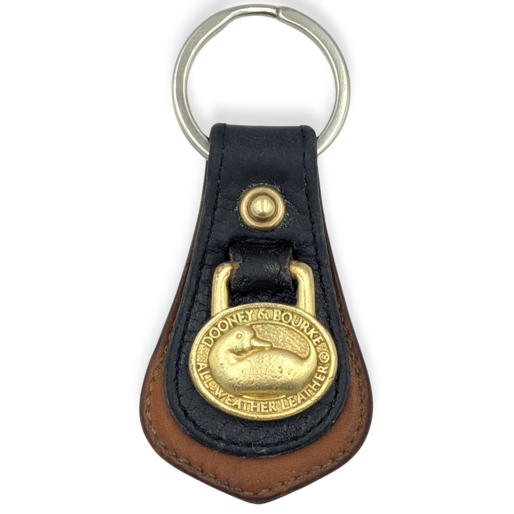 Dooney & Bourke All Weather Leather Vintage Keychain Black Tan Duck Logo Brass